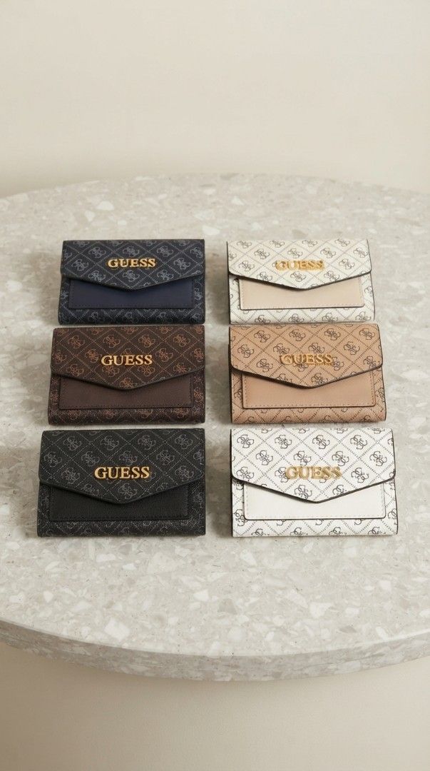 Trifold Small Wallets - Various Colours & Styles (Category: Wallets & Card holders) located in Davao. Submitted by nisa_chan04 (Listing ID 1462373891, Image 1). Description: - Small size wallets - Featuring signature monograms or logos - Available in multiple colors and patterns - Some designs are tri-fold with card slots and coin pockets - Ideal for keeping your essentials organized - Please check photos for specific designs and colors.
