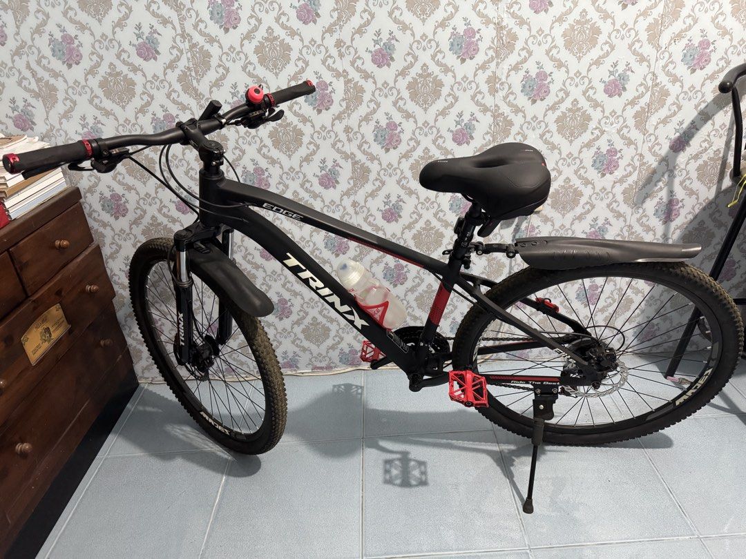 TRINX EDGE ELITE (27.5”) Mountain Bike (Category: Bicycles) located in Binan City. Submitted by izza1311 (Listing ID 1462341281, Image 1). Description: TRINX EDGE ELITE (27.5”) SPECS: ✅SHIFTER: SHIMANO TOURNEY 3X7 SPEED ✅ALLOY INTERNAL FRAME (S) ✅SUSPENSION FORK ✅TIRES: 27.5x2.10 ✅TRINX HYDRAULIC DISC BRAKE Upgrade: - New handle grip - New pedal - Confortable saddle - Mud guard front and back Use only 2x - super bago pa Rfs: moving out .