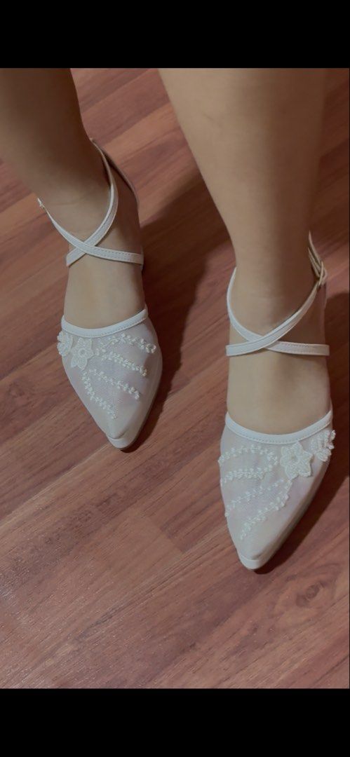 True Story Evermore Bridal Heels (Category: Heels) located in Mandaluyong City. Submitted by stephmariano (Listing ID 1462330616, Image 2). Description: - Brand: True Story Evermore - Style: Seraphina Bridal Heels - Color: White - Design: Chic pointed toe with delicate lace and floral embellishments - Closure: Secure ankle strap with buckle - Heel: 3” VERY Comfortable block heel (feels like 2.5in due to the platform) - Sole: 0.5” Trendy platform 