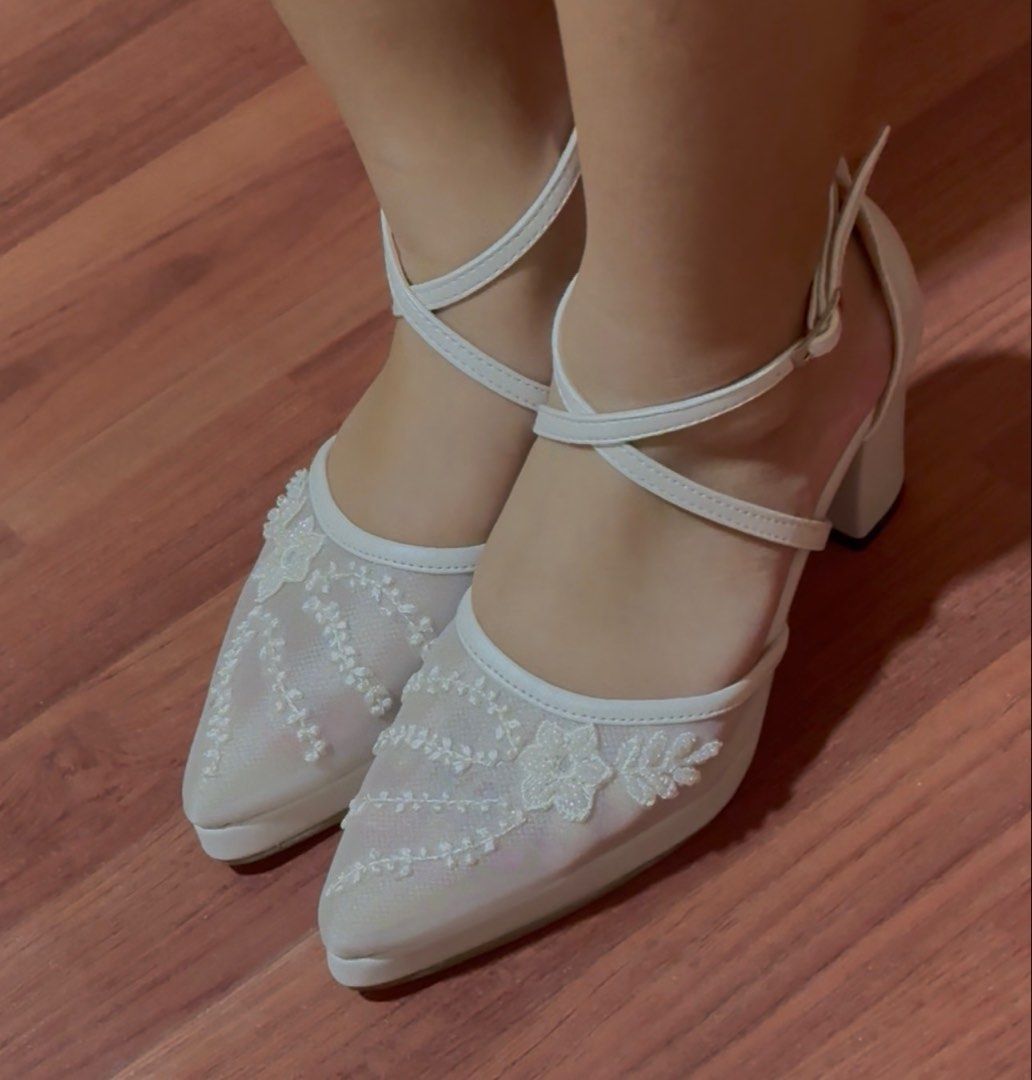 True Story Evermore Bridal Heels (Category: Heels) located in Mandaluyong City. Submitted by stephmariano (Listing ID 1462330616, Image 1). Description: - Brand: True Story Evermore - Style: Seraphina Bridal Heels - Color: White - Design: Chic pointed toe with delicate lace and floral embellishments - Closure: Secure ankle strap with buckle - Heel: 3” VERY Comfortable block heel (feels like 2.5in due to the platform) - Sole: 0.5” Trendy platform 