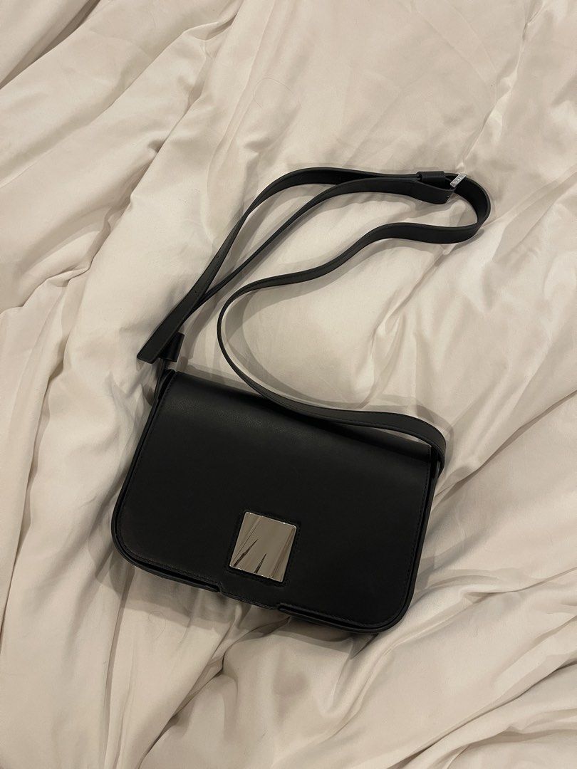 Tumi Black Leather Olas Shoulder Bag (Category: Cross-body Bags) located in San Juan City. Submitted by declutterrrsale (Listing ID 1462324643, Image 1). Description: Barely used! Good as brand new. Selling for almost half the price. Store price is 45K! RFS: not using - Brand: Tumi - Material: Black Leather - Design: Sleek with silver hardware accents - Strap: Adjustable for comfortable wear - Interior: Multiple compartments for organization - Be