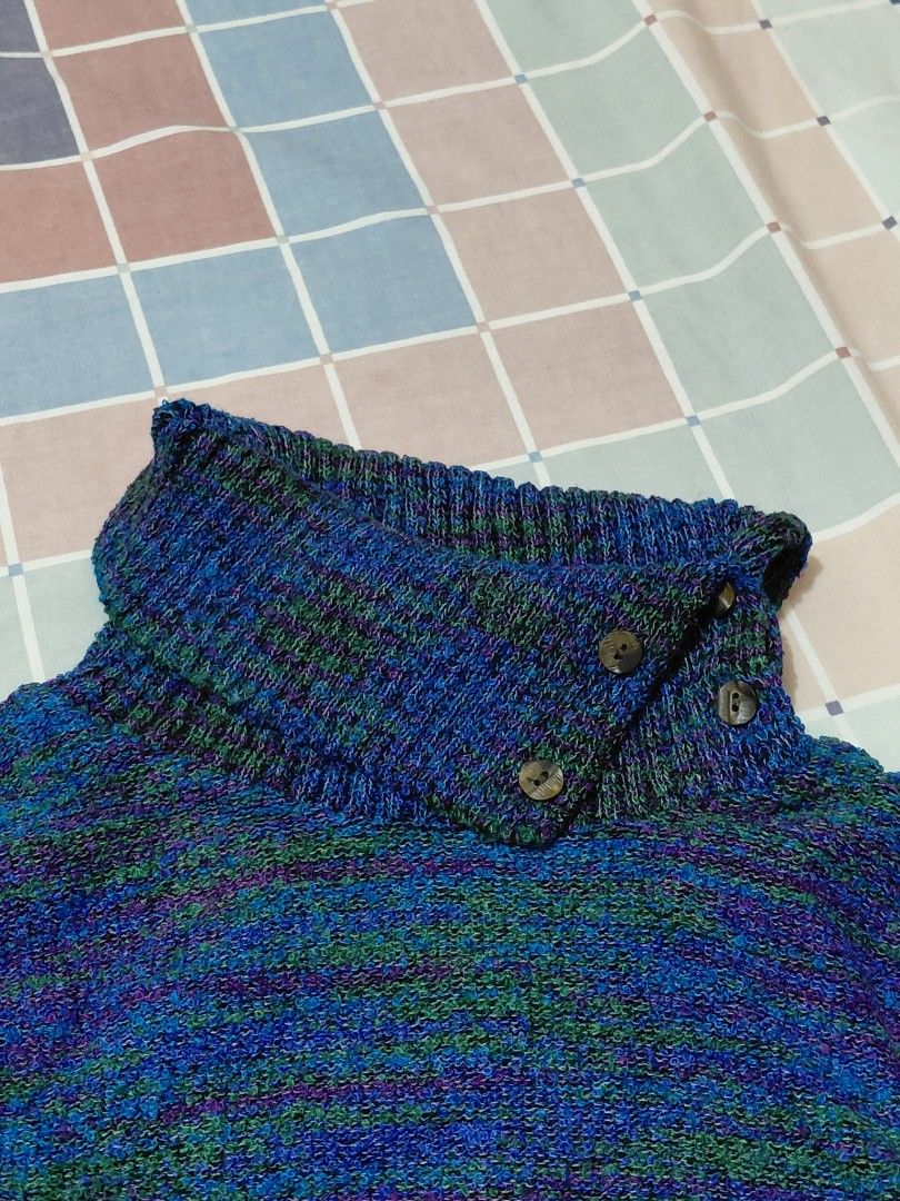 Turtleneck Sweater (Category: Longsleeves) located in Manila. Submitted by plath-itudes (Listing ID 1462333114, Image 2). Description: - knitted turtleneck sweater - unique multi-color yarn in blues, greens, and purples, sooo pretty 🫶 - ribbed cuffs and hem for a snug fit - two decorative buttons on the collar - no flaws.