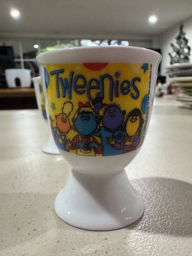 Tweenies Egg Cups BBC Licensed (2pcs) (Category: Coffee & Tea Tableware) located in Quezon City. Submitted by meggoquingco (Listing ID 1462326198, Image 2). Description: - Set of 2 Tweenies egg cups - Features characters from the popular show - Made of durable ceramic - Perfect for kids' breakfast or collectors' display - Licensed by BBC Worldwide Ltd..