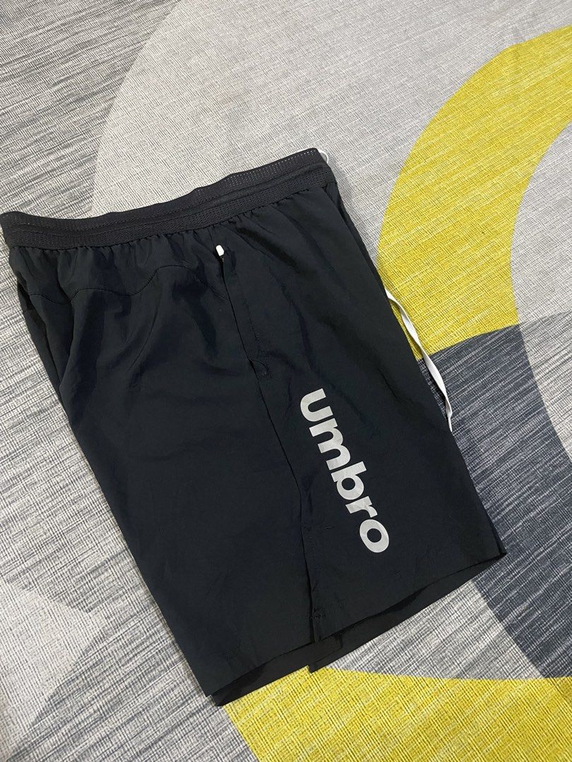 Umbro mens running short (Category: Shorts) located in Taytay. Submitted by ekselentekondisyon (Listing ID 1462388877, Image 2). Description: Umbro mens running short Drifit Size medium on tag W-29-34 L-19.5 Leg opening-12 Excellent condition Taytay rizal location W/zipper yung side pockets.