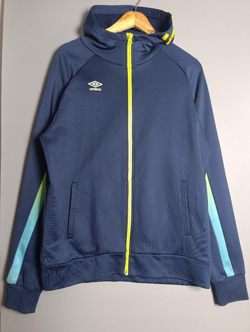 Umbro Navy Blue Zip-Up Hoodie Jacket (Category: Coats, Jackets and Outerwear) located in Magalang. Submitted by acethriftonlineshop (Listing ID 1462433319, Image 1). Description: Umbro Full-Zip Hoodie Track Jacket Dimension: 23 x 28 Size: L-XL Price: 549.