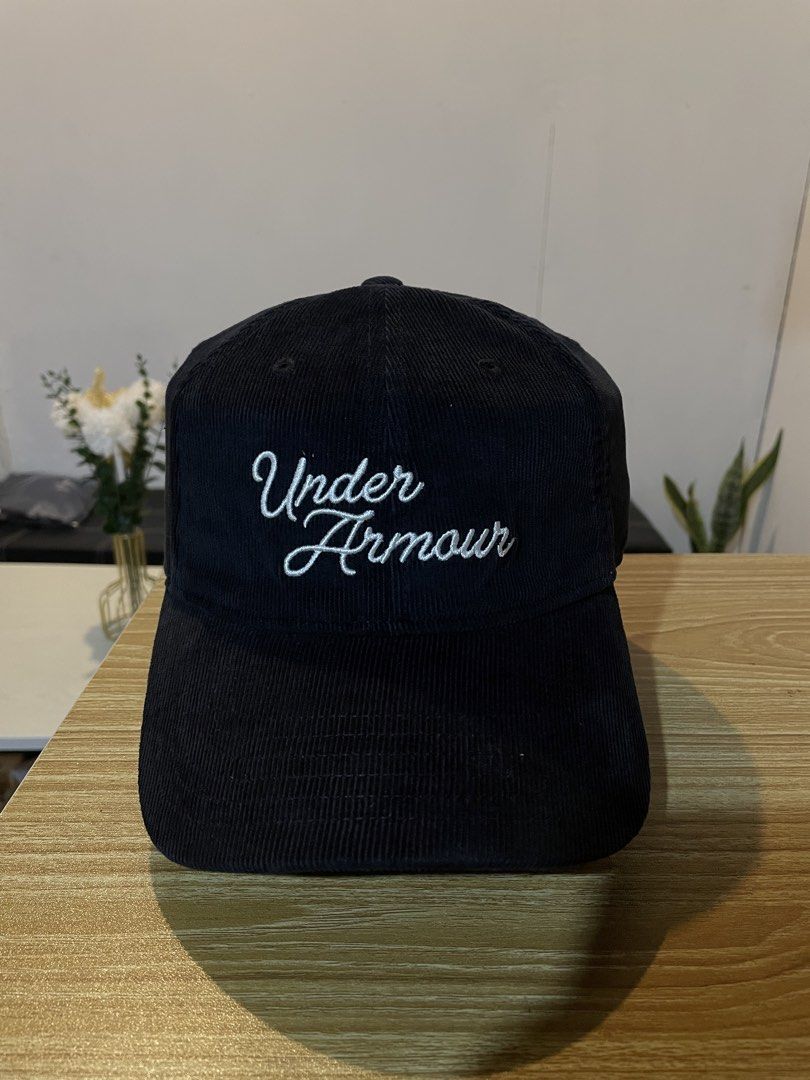 Under Armour Sportstyle Corduroy Adjustable Cap (Category: Caps & Hats) located in Bacolod City. Submitted by maxpeynthrift (Listing ID 1462418841, Image 1). Description: OSFA Excellent condition cut tag only 100% authentic Material: Crafted from a durable, textured corduroy cotton-blend fabric. Design: Features retro-style script “Under Armour” embroidery across the front panels. Fit: Unstructured front panels for a relaxed, low-profile fit, com