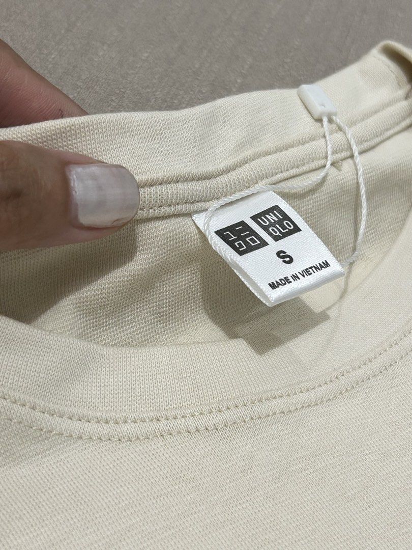 Uniqlo Basic T-Shirt Size S Cream (Category: Shirts) located in Quezon City. Submitted by hygge.elements (Listing ID 1462399436, Image 2). Description: - Cream colored croptop Uniqlo T-shirt - Size: S - Short sleeves, crew neck - Made in Vietnam - Soft fabric for ultimate comfort - Versatile for layering or solo wear - originally price Php 790.