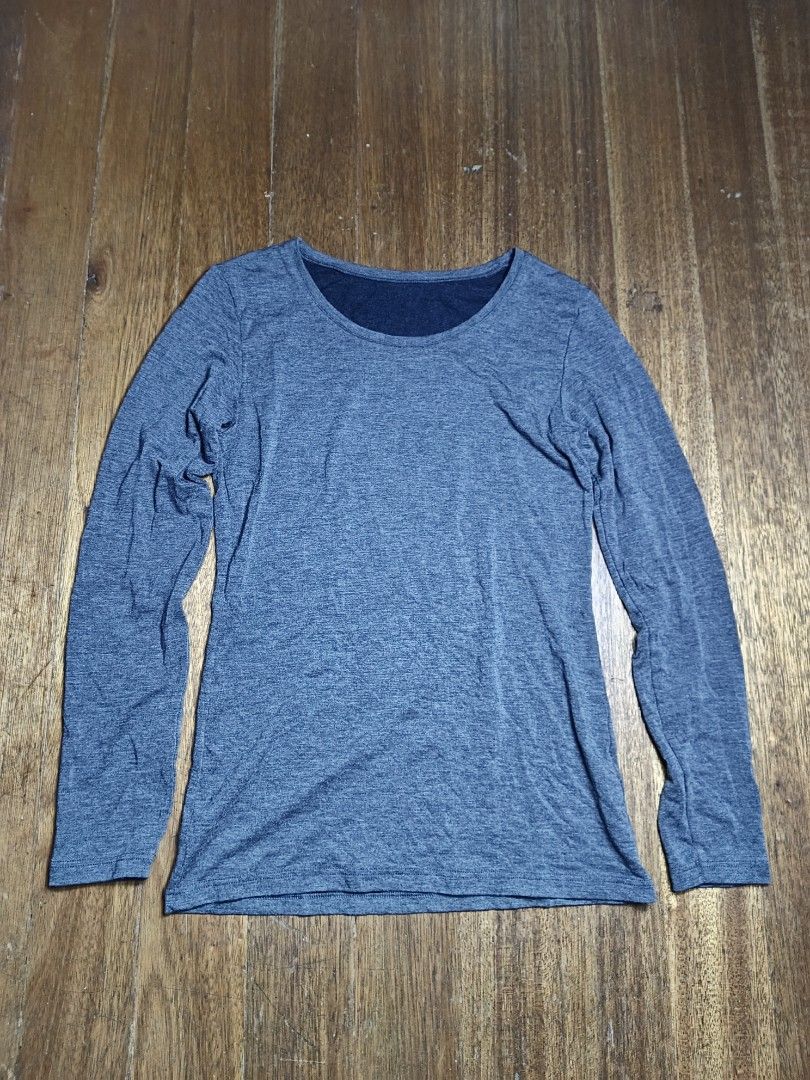 Uniqlo HEATTECH Extra Warm medium women's (Category: Longsleeves) located in Mandaluyong City. Submitted by heatgear (Listing ID 1462367578, Image 1). Description: good condition no issue - Uniqlo HEATTECH Extra Warm Long-Sleeved Shirt - Color: Grey - Size: Medium (M) - Origin: Made in Vietnam - Material: Acrylic, Rayon, Polyester, Spandex blend - Features: Excellent for layering or wearing alone, provides superior warmth and comfort. bust 80-86 