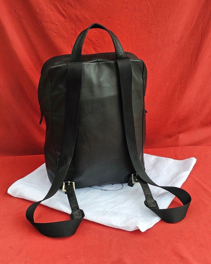 🛑Unisex Prada Black Soft Leather Small to Medium Backpack Bag (Category: Luxury Bags & Wallets) located in Baguio. Submitted by bagluxers_haven (Listing ID 1462313502, Image 2). Description: 🛑Authentic Unisex Prada Small (To Medium) Black Soft Leather Zip Top Backpack Bag. 》Spacious enough interior w/ a zip side pocket; & an extra large zip pocket outfront 🛑Very Good Condition without inclusions. No Flaws to Declare 🛑DIMENSION : 9"LX 12"H X 4