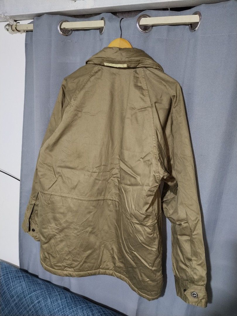 UNITED CARR by Buzz Rickson's Intermediate Field Jacket - (Category: Coats, Jackets and Outerwear) located in Pasig City. Submitted by loveforlux_2025 (Listing ID 1462339726, Image 3). Description: - Khaki Intermediate field jacket from UNITED CARR - Vintage From 1999 Archive - Warm, fuzzy lining for extra comfort - Multiple functional pockets on the front - Zipper and button closure for secure fit - Ideal for cooler weather - Hood attachment ins