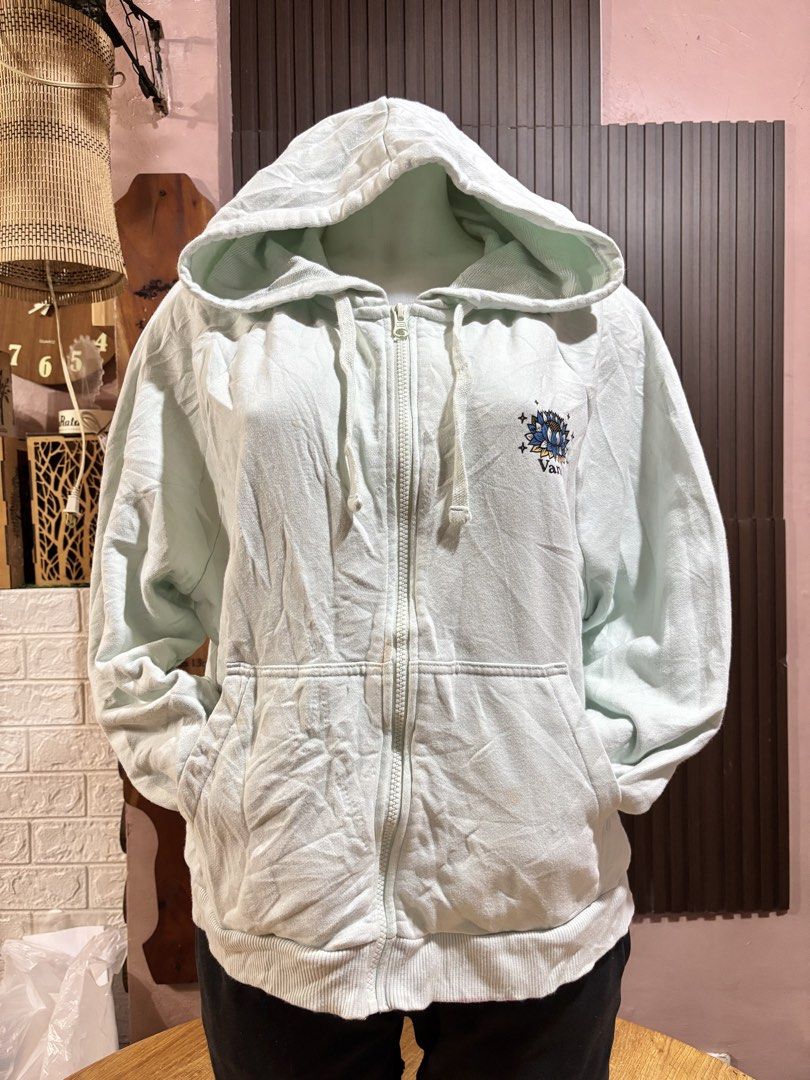 Vans Zip-Up Hoodie - Light Blue - Size Medium (Category: Coats, Jackets and Outerwear) located in Manila. Submitted by danirivera21 (Listing ID 1462438856, Image 1). Description: - Light blue Vans zip-up hoodie - Size: Medium - Graphic: Butterfly and floral design on the back, small Vans logo on the chest - Features: Drawstring hood, front pockets - Style: Great for casual wear.