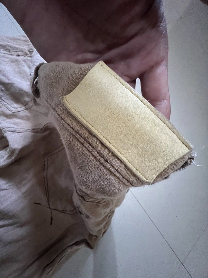 Versace Collection Linen Blend Pants (Category: Other Bottoms) located in Caloocan City. Submitted by vintage2333 (Listing ID 1462378386, Image 3). Description: - Lightweight linen blend pants - Brand: Versace Collection - Color: Neutral beige - Style: Flared leg - Closure: Button and zip - Features: Pockets - Versatile for casual or dressed-up looks - Please check photos for condition details.