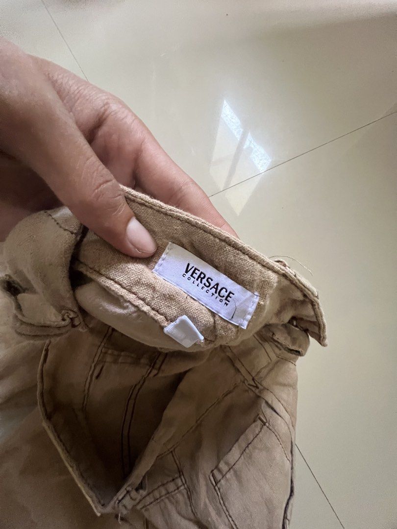 Versace Collection Linen Blend Pants (Category: Other Bottoms) located in Caloocan City. Submitted by vintage2333 (Listing ID 1462378386, Image 2). Description: - Lightweight linen blend pants - Brand: Versace Collection - Color: Neutral beige - Style: Flared leg - Closure: Button and zip - Features: Pockets - Versatile for casual or dressed-up looks - Please check photos for condition details.