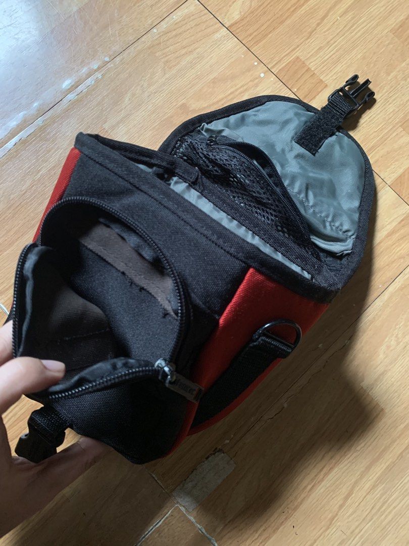Vintage 1990s Tamrac camera bag/small bag (Category: Belt bags, Clutches and Pouches) located in Cagayan de Oro. Submitted by premium_thrifts (Listing ID 1462276363, Image 3). Description: Good condition. Has multiple slots. Mostly red colorway Issue: missing sling Add shipping fee (via JRS or J&T).