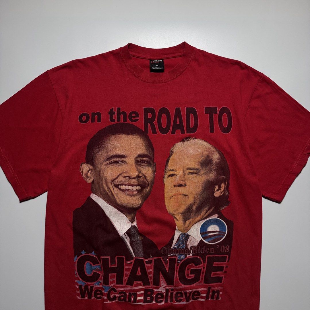 VINTAGE 2008 OBAMA BIDEN TEE (Category: Tshirts & Polo Shirts ) located in Cebu City. Submitted by firenzegallery (Listing ID 1462425515, Image 2). Description: - Authentic 2008 Obama-Biden campaign red t-shirt - Features 'On The Road To Change' slogan - Includes portraits of Barack Obama and Joe Biden - Bold and clear graphic print - Size XL - Made by ATOM - Perfect for collectors and supporters.