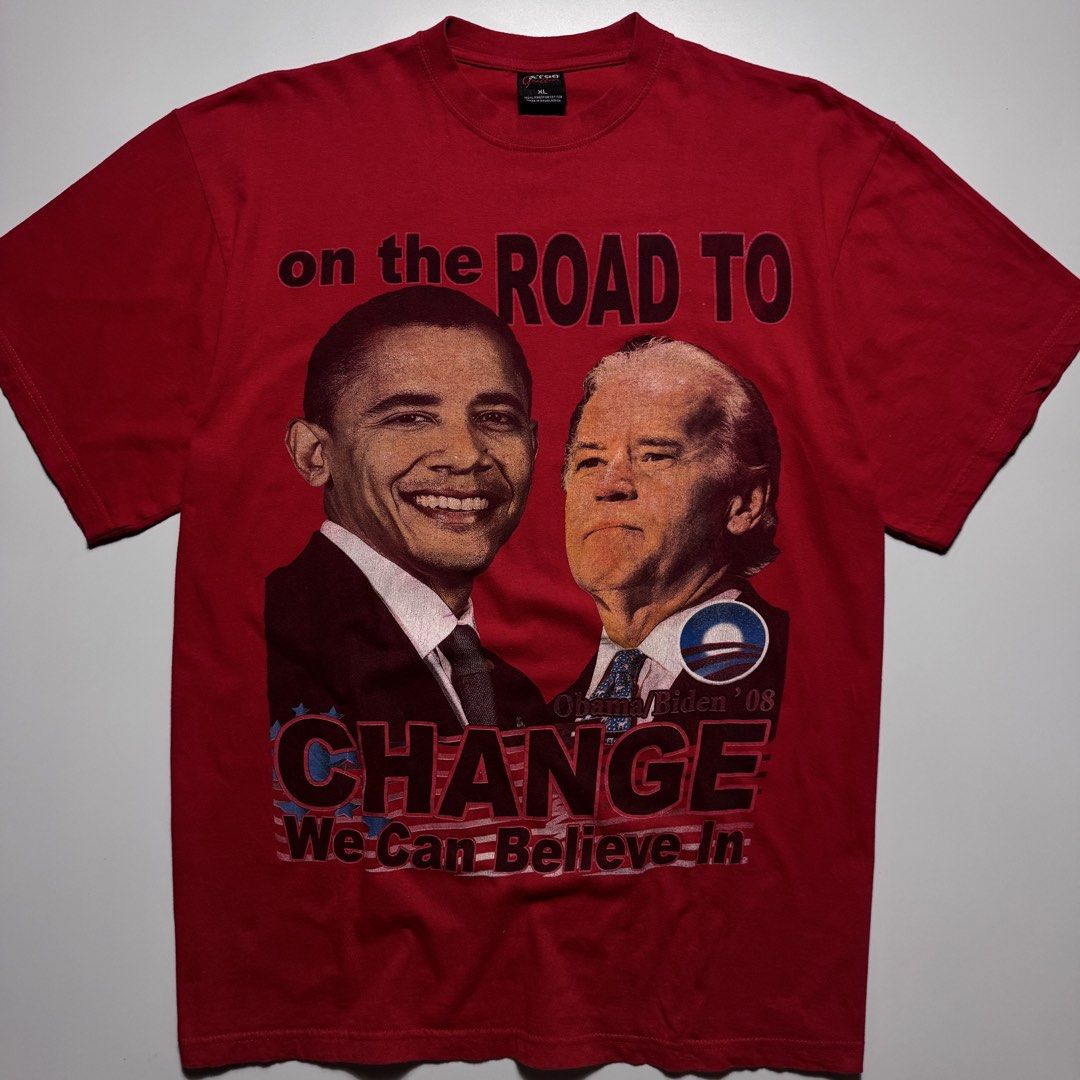 VINTAGE 2008 OBAMA BIDEN TEE (Category: Tshirts & Polo Shirts ) located in Cebu City. Submitted by firenzegallery (Listing ID 1462425515, Image 3). Description: - Authentic 2008 Obama-Biden campaign red t-shirt - Features 'On The Road To Change' slogan - Includes portraits of Barack Obama and Joe Biden - Bold and clear graphic print - Size XL - Made by ATOM - Perfect for collectors and supporters.