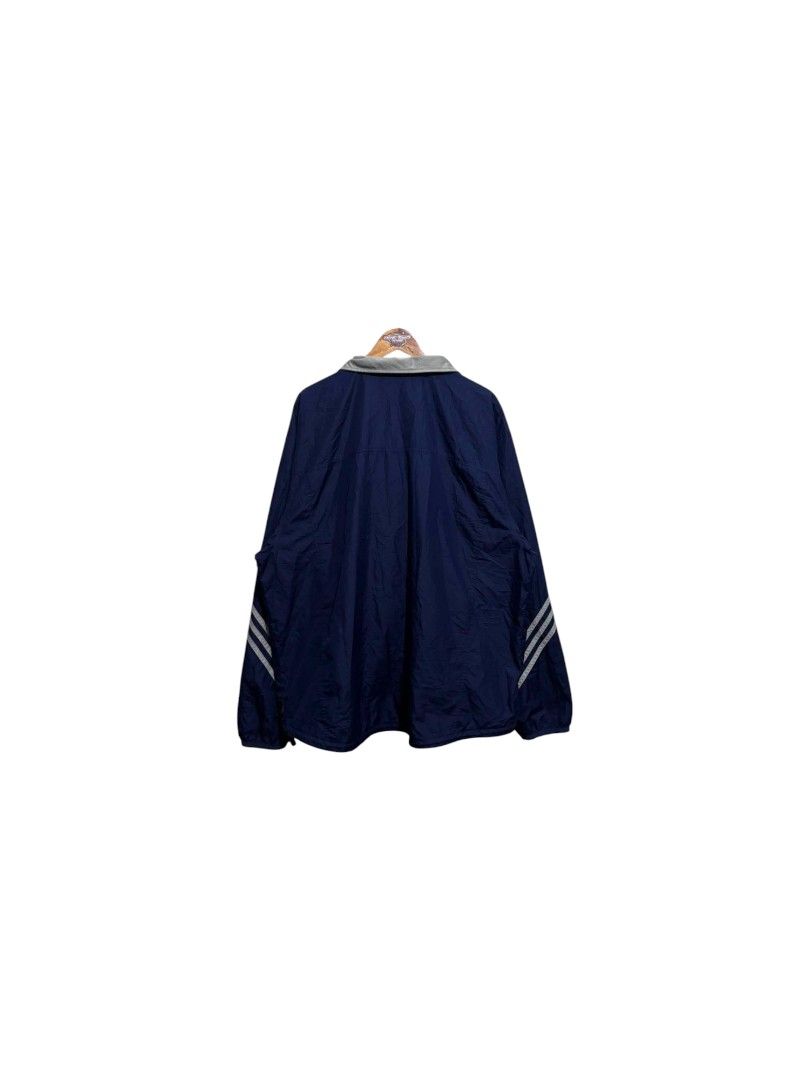Vintage 90s Adidas Windbreaker Jacket (Category: Coats, Jackets and Outerwear) located in Bauan. Submitted by onetwothrift2 (Listing ID 1462302129, Image 2). Description: Vintage 90s Adidas Windbreaker Jacket Size: XL Dimes: L31 W28 Color rate: 10/10 Excellent condition Issue: wala na mesh lining sa loob.
