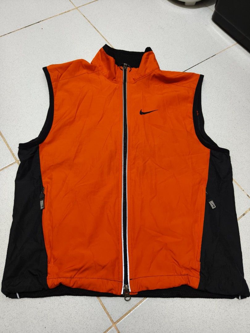 vintage 90s nike orange vest (Category: Coats, Jackets and Outerwear) located in Manila. Submitted by truehorse-68cf (Listing ID 1462283619, Image 1). Description: width 20.5 lenght 24 authentic accepting offers excellent condition.