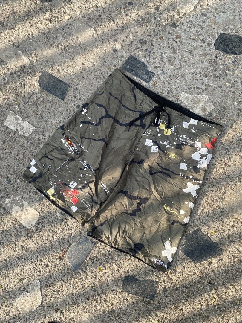 Vintage Billabong Camo Paint Splatter Board Shorts (Category: Shorts) located in Caloocan City. Submitted by gaylawanna22819 (Listing ID 1462437101, Image 2). Description: - Cool Billabong board shorts - Unique camouflage and paint splatter graphic print - Drawstring waist for adjustable fit - Convenient side cargo pocket - Ideal for beach, pool, or any adventure.