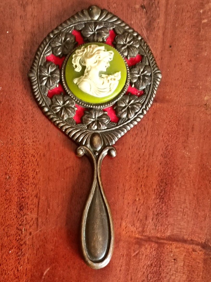 Vintage Cameo-style Hand Mirror (Category: Mirrors) located in Imus. Submitted by ABrielleC (Listing ID 1462263122, Image 1). Description: Metal Alloy Frame Length-12.5cm Diameter-6cm Japan Surplus Item First to pay Loc Imus Cavite.