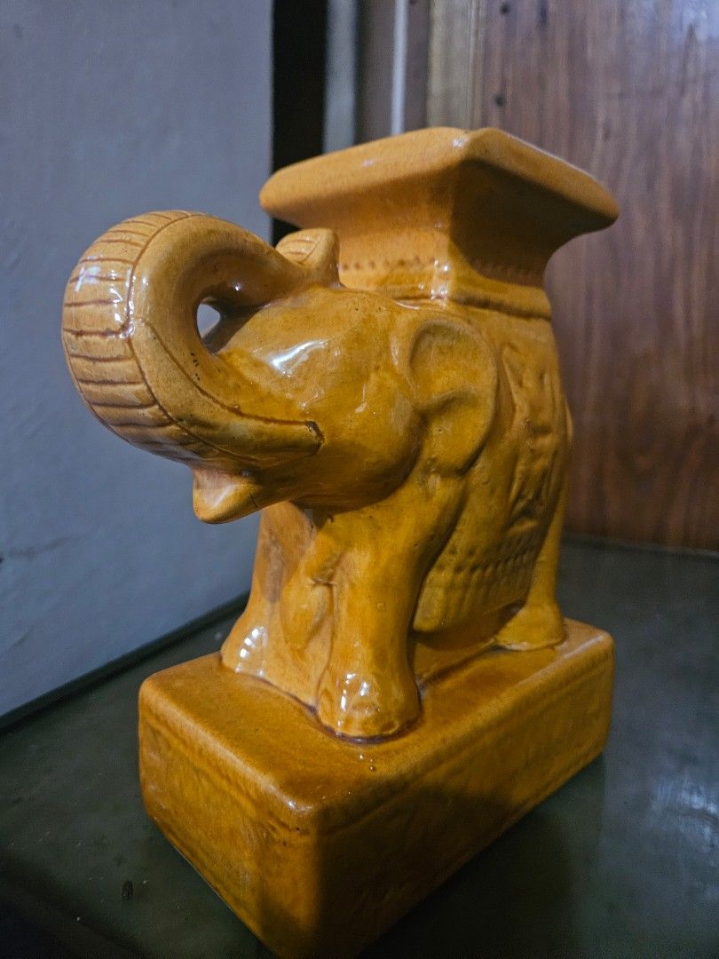 Vintage Ceramic Elephant Ashtray (Category: Other Home Decor) located in Antipolo. Submitted by pengzkibus-92087 (Listing ID 1462327650, Image 1). Description: Cute ceramic elephant, perfect as a bookend or decor. Features a glossy amber glaze. Adds charm to shelves/desks. Ideal for elephant enthusiasts..