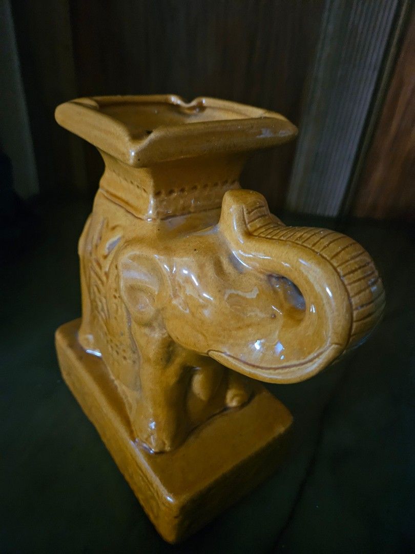 Vintage Ceramic Elephant Ashtray (Category: Other Home Decor) located in Antipolo. Submitted by pengzkibus-92087 (Listing ID 1462327650, Image 3). Description: Cute ceramic elephant, perfect as a bookend or decor. Features a glossy amber glaze. Adds charm to shelves/desks. Ideal for elephant enthusiasts..
