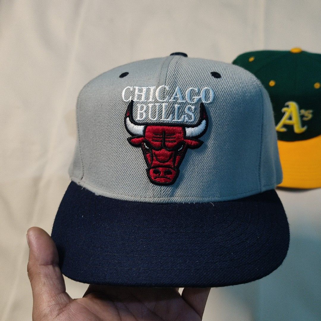 Vintage Chicago bulls Snapback (Category: Caps & Hats) located in Tarlac. Submitted by joel_dat_kom_187 (Listing ID 1462359704, Image 1). Description: vintage Chicago bulls snapback hat 2tone excellent used condition 9.8/10 colorate 9.8/10 condition one size fits all adult size wool material no flaws/ issue need wash only.