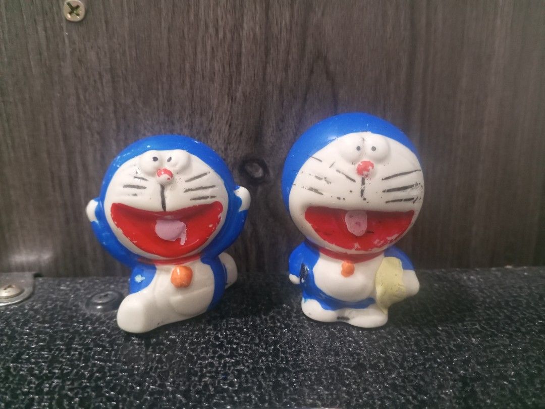 Vintage Doraemon Ceramic Figurines (Category: Vintage Collectibles) located in Manila. Submitted by _iannyyy (Listing ID 1462337939, Image 1). Description: Ideal for Doraemon enthusiasts and collectors. Condition: 7.5/10 - Shows some signs of paint wear, adding to their character. - Compact size, perfect for display on shelves or desks..