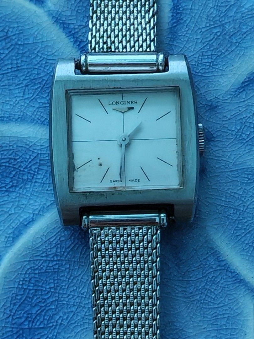 Vintage Longines Carrée (Category: Luxury Watches) located in Trece Martires City. Submitted by heirloomhoursph (Listing ID 1462424558, Image 1). Description: ✨ Heirloom Hours – Available Piece ✨ Vintage Longines Carrée Php 10,499 + sf Details: ■ Brand/Series: Longines ■ Model Number: 16285621 ■ Movement: Manual Winding ■ Design Origin: Swiss ■ Case Size: 21mm ■ Wrist Size: 18cm (max) ■ Condition: 8/10 (issue on dial) ■ Comes with replacement box