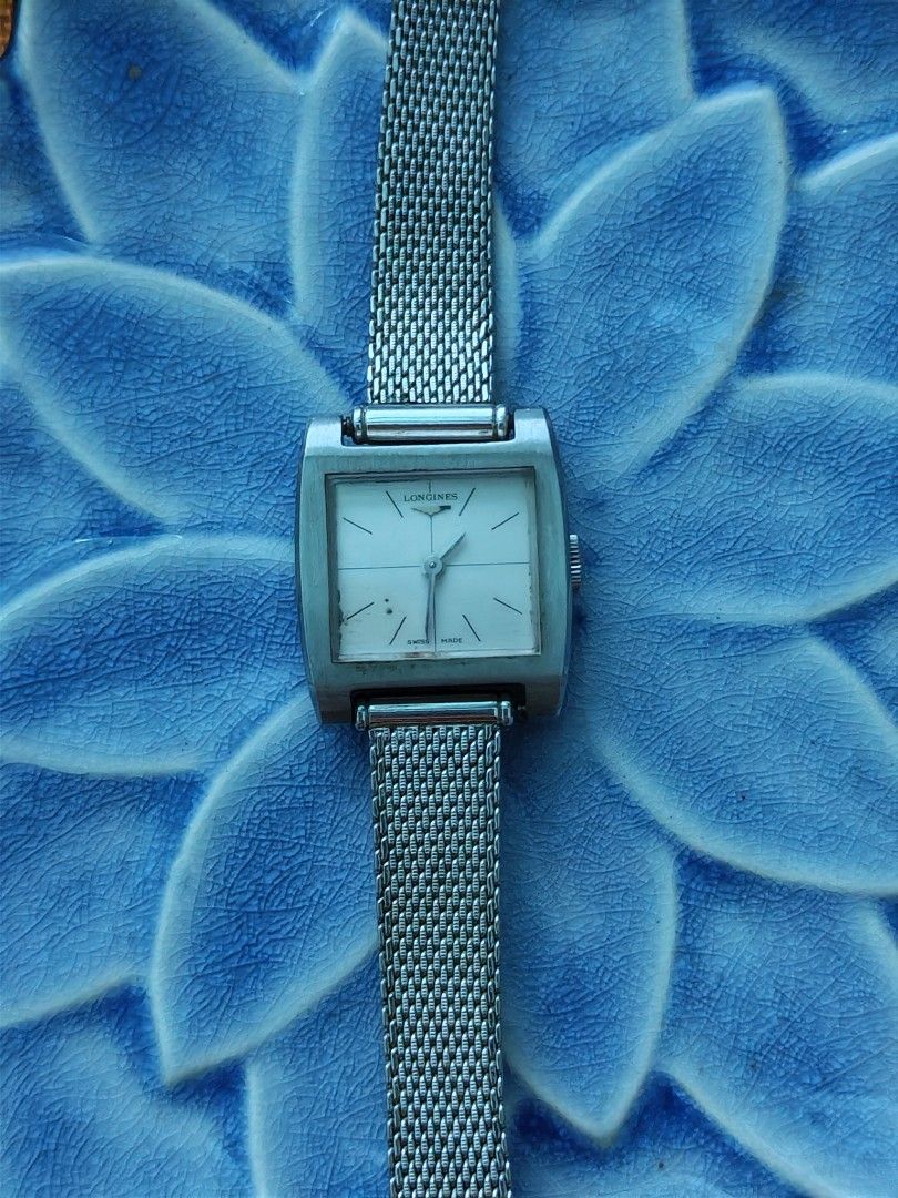 Vintage Longines Carrée (Category: Luxury Watches) located in Trece Martires City. Submitted by heirloomhoursph (Listing ID 1462424558, Image 2). Description: ✨ Heirloom Hours – Available Piece ✨ Vintage Longines Carrée Php 10,499 + sf Details: ■ Brand/Series: Longines ■ Model Number: 16285621 ■ Movement: Manual Winding ■ Design Origin: Swiss ■ Case Size: 21mm ■ Wrist Size: 18cm (max) ■ Condition: 8/10 (issue on dial) ■ Comes with replacement box