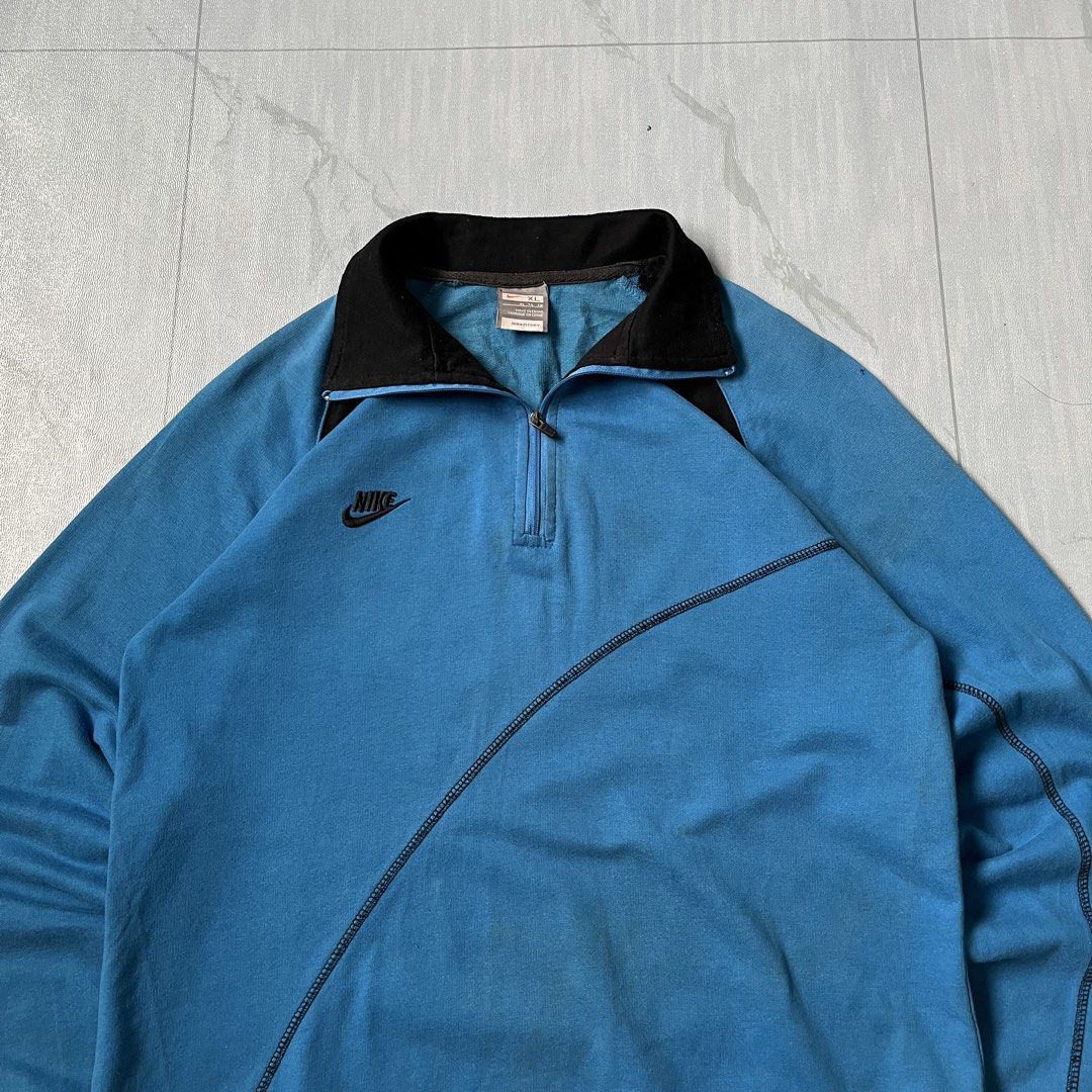 Vintage Nike HalfZip Embroided Logo (Authentic) (Category: Coats, Jackets and Outerwear) located in Cavite. Submitted by newclassicwear (Listing ID 1462329504, Image 2). Description: Vintage Nike Half Zip Embroided Logo M On Tag (19width 26length) Excellent Condition. 9.7 Honest Color Rate. Dot Hole On Upper Shoulder Part Not Visible. .