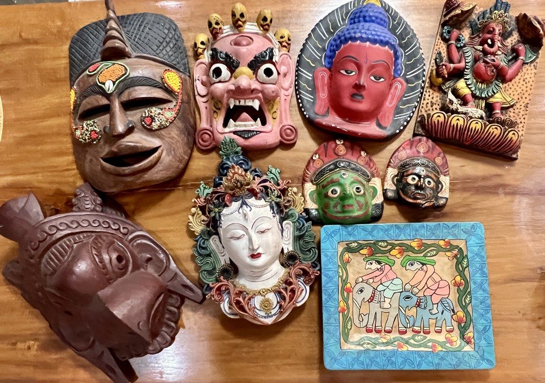 Vintage Tribal Mask Wall Decor (Category: Wall Decor) located in Rosario. Submitted by chasiebananie (Listing ID 1462297535, Image 1). Description: - Crafted from wood, some with intricate beadwork; papier-mâché - Ideal for enhancing home decor or creating cultural displays - Adds character and a unique touch to any room Personally collected. Most of the masks are from Nepal and one from Africa. One small mask is broken (black) so I am just givin
