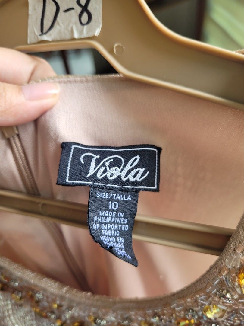Viola Gold Bodycon Evening Gown Size 10 (Category: Evening dresses & gowns) located in Muntinlupa City. Submitted by havilahph (Listing ID 1462328209, Image 2). Description: Evening gown with jewel-adorned neckline from Viola, size 10. Fits around size L or so. Beautiful for nights out, weddings, and parties!.