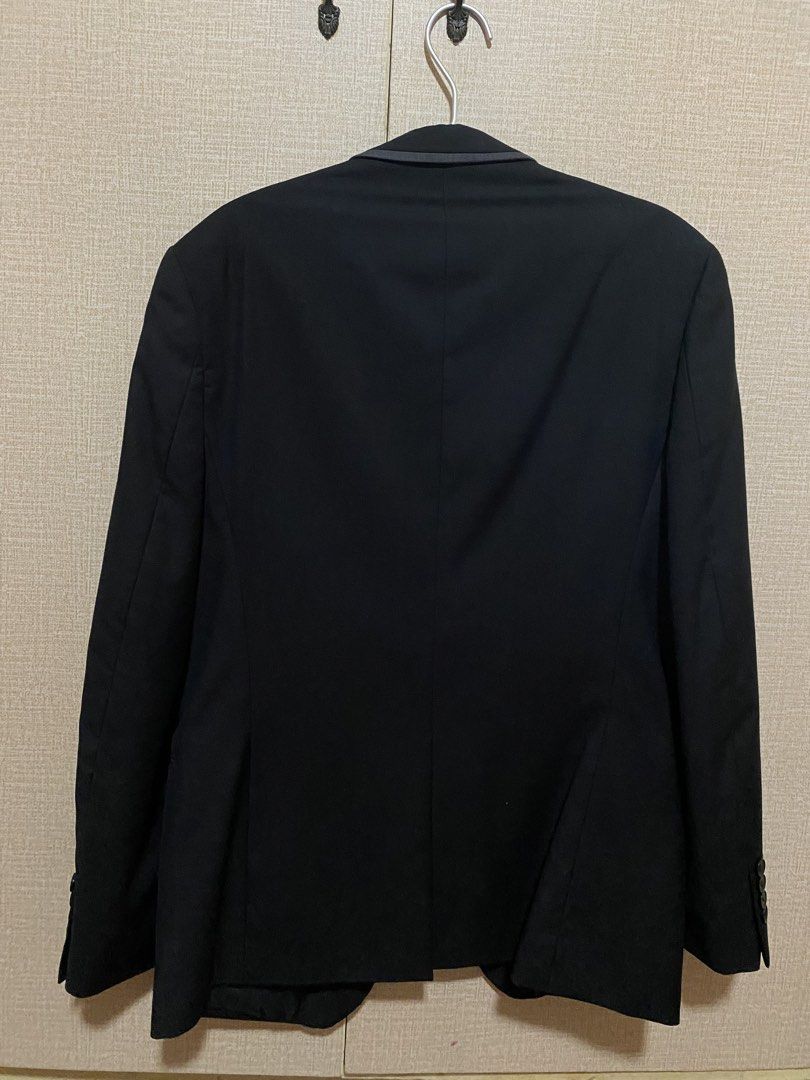 Wall Street Black Suit Jacket (Category: Coats, Jackets and Outerwear) located in Quezon City. Submitted by babyblue2022 (Listing ID 1462296372, Image 2). Description: - Professionally dry-cleaned already - Brand: Wall Street - Color: Black - Size: M - Material: 70% Polyester, 30% Viscose - Closure: Single button - Details: Subtle dark grey trim on lapels and pockets - Occasion: Formal events, business wear.