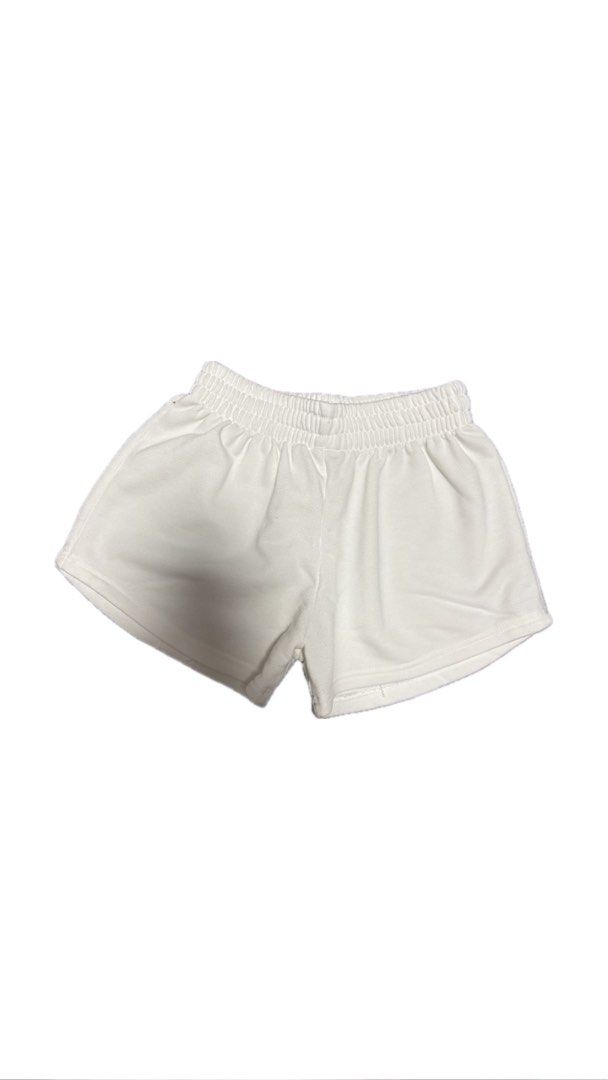 White Elastic Waist Shorts (Category: Shorts) located in Paranaque City. Submitted by nikadeclutters (Listing ID 1462346083, Image 1). Description: Comfy basic white shorts with elastic waist. Perfect for lounging or casual outfits. Easy to match with any top!.