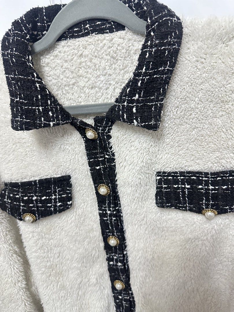 White Fuzzy Jacket with Black Tweed Trim (Category: Coats, Jackets and Outerwear) located in Quezon City. Submitted by jeydeegmr (Listing ID 1462410786, Image 3). Description: - Super soft white fuzzy fabric - Chic black tweed trim on collar, pockets, and cuffs - Pearl-like button front closure - Cropped length for a stylish silhouette - Ideal for cozy layering.