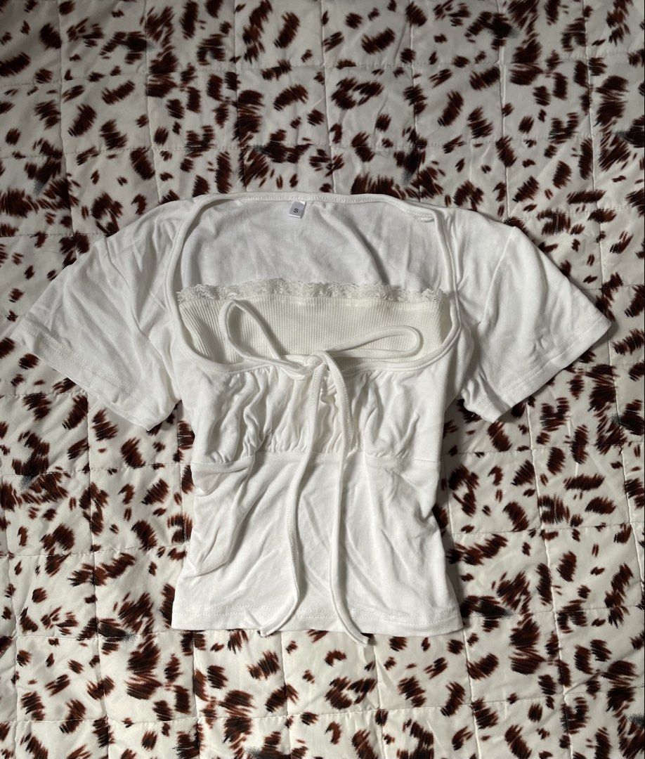 White Lace Trimmed Corset Style Top (Category: Others Tops) located in Manila. Submitted by bamz.col (Listing ID 1462287955, Image 1). Description: • xs - semi medium • washed (ready to wear) • flaws: none • condition: 10/10 mop: gcash mod: J&T 𐙚˚࿔ no to joy miners | no deleting comments | no cancellations | don’t mine if you cannot pay on time..