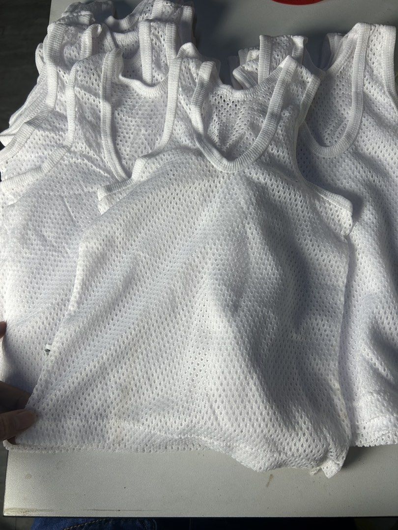 White Mesh Tank Tops Bundle 12pcs Medium Size (Category: Sleeveless) located in Paranaque City. Submitted by super_9.9 (Listing ID 1462349791, Image 2). Description: 📦 **READY TO SHIP** 🚚 **Monday – Friday** ⏰ **9:00 AM – 6:00 PM** 12 - Bundle of white mesh tank tops - Breathable and lightweight fabric - Versatile: great for layering or wearing on its own - Suitable for sports or casual wear - Multiple sizes available (check photos for details)