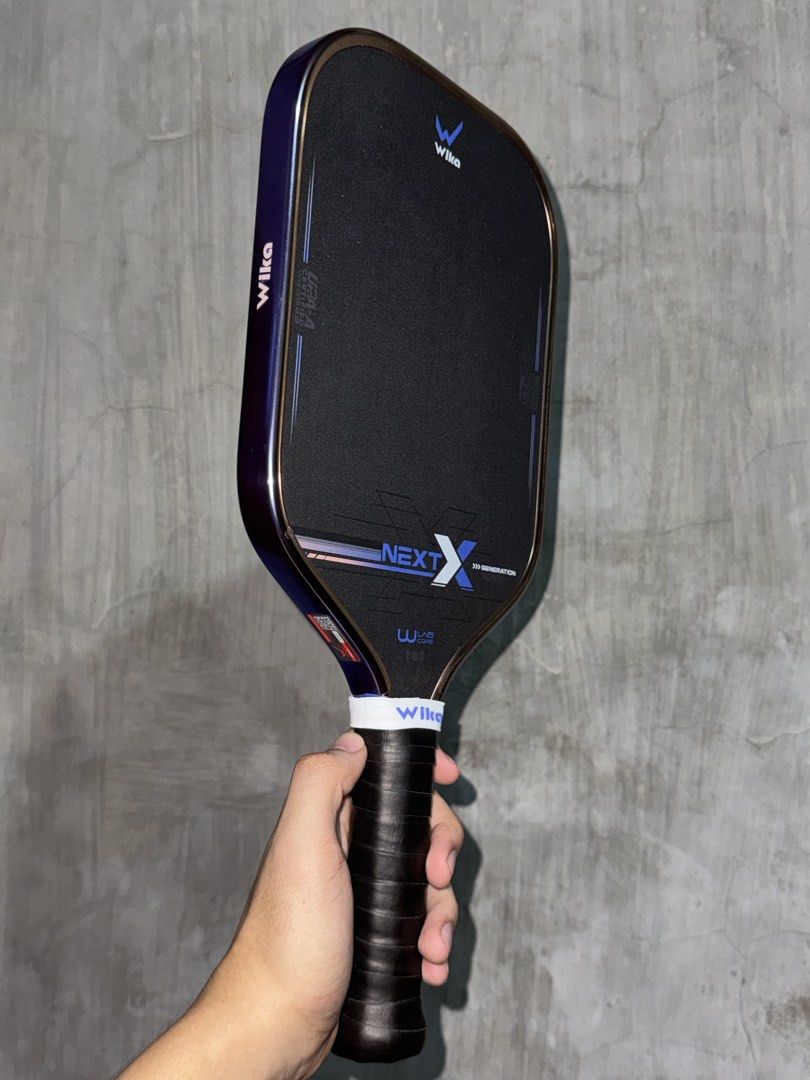 Wika Next X (Category: Racket and Ball Sports) located in San Fernando. Submitted by marcsarmac20 (Listing ID 1462352421, Image 3). Description: ❗️FOR SALE❗️ · Wika Next X · Metallic Purple · 2 Weeks Old · With Bag · 6500 Only.