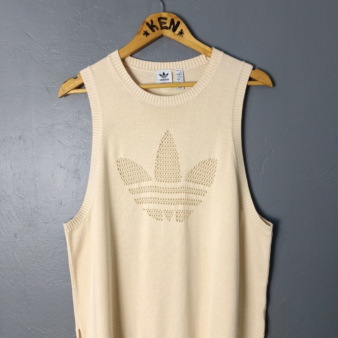 Women's - Adidas (Category: Sleeveless) located in Bacolod City. Submitted by drop.ph (Listing ID 1462365786, Image 1). Description: Adidas - Knitted Top Authentic *Size L fits XL - 22x27 *Excellent *Minor dirt *Price: 880php *Add SF if outside Bacolod City .