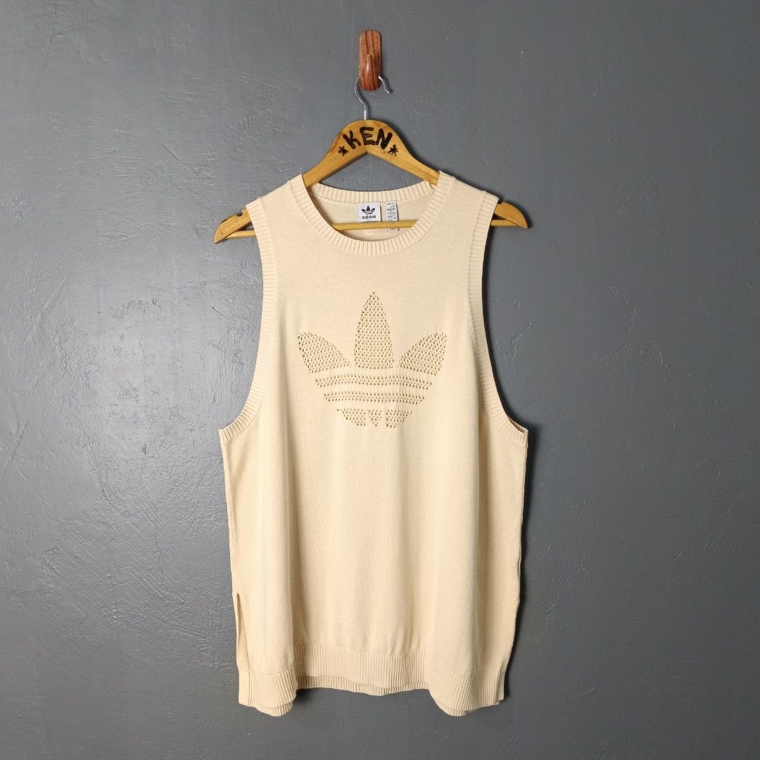 Women's - Adidas (Category: Sleeveless) located in Bacolod City. Submitted by drop.ph (Listing ID 1462365786, Image 2). Description: Adidas - Knitted Top Authentic *Size L fits XL - 22x27 *Excellent *Minor dirt *Price: 880php *Add SF if outside Bacolod City .
