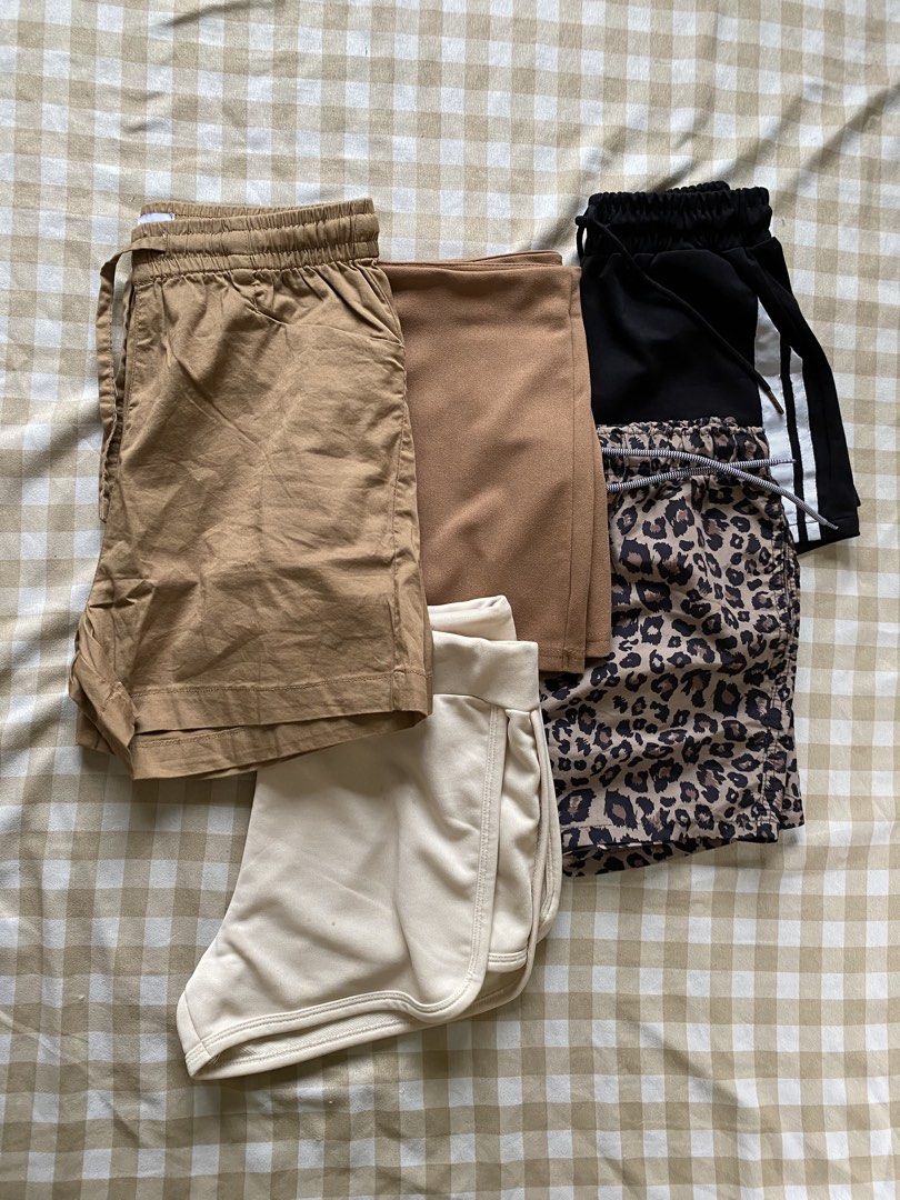 Declutter Bundle: 5 Pieces Shorts & Skort (Casual, Athletic, Lounge) (Category: Other Bottoms) located in Santa Maria. Submitted by closetclearout_co (Listing ID 1462277204, Image 1). Description: Shorts & Skort Declutter Bundle (5 Pieces) Selling all 5 bottoms together at a discounted price! Includes: 1 Pair of Subdued tan/khaki casual drawstring shorts with front pockets 1 Camel brown side-button wrap skort 1 Pair of black sporty shorts with do