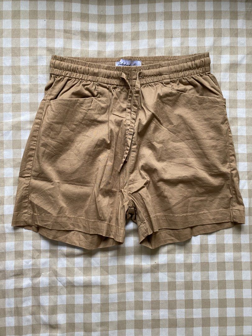 Declutter Bundle: 5 Pieces Shorts & Skort (Casual, Athletic, Lounge) (Category: Other Bottoms) located in Santa Maria. Submitted by closetclearout_co (Listing ID 1462277204, Image 2). Description: Shorts & Skort Declutter Bundle (5 Pieces) Selling all 5 bottoms together at a discounted price! Includes: 1 Pair of Subdued tan/khaki casual drawstring shorts with front pockets 1 Camel brown side-button wrap skort 1 Pair of black sporty shorts with do
