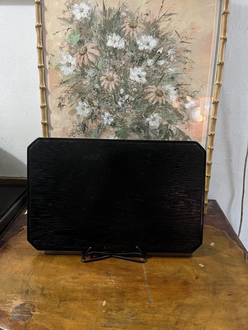 Wood Black and Red Octagonal Serving Tray (Category: Other Kitchenware & Tableware) located in Taguig. Submitted by minmin_parker (Listing ID 1462348258, Image 2). Description: - Elegant octagonal serving tray - Striking black with a vibrant red trim - Textured surface for a secure grip - Ideal for serving snacks and beverages - Displayed on a stand (stand not included) - Approximate dimensions: 14 inches x 9 inches.