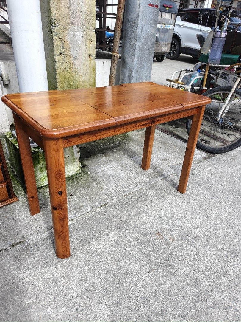 Wooden Dressing Table with Mirror and Storage (Category: Tables & Sets) located in Valenzuela. Submitted by kendra071914 (Listing ID 1462268721, Image 2). Description: - Solid wood dressing table - Features a flip-up mirror - Includes a convenient storage compartment - Beautiful warm wood tone - Sturdy and reliable legs - Perfect as a vanity or small desk.
