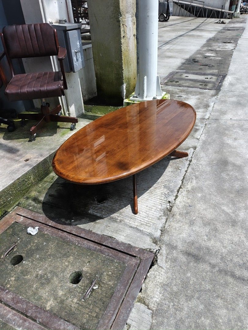 Wooden Oval Coffee Table solid wood Japan surpluz (Category: Tables & Sets) located in Valenzuela. Submitted by kendra071914 (Listing ID 1462266922, Image 3). Description: - Solid wood coffee table with an elegant oval top. - Features a beautiful, warm wood tone. - Supported by four stable legs for durability. - Dimensions: Height 38cm, Length 135cm, Width 74cm. - Ideal for enhancing your living room or lounge area. - Pick up only..