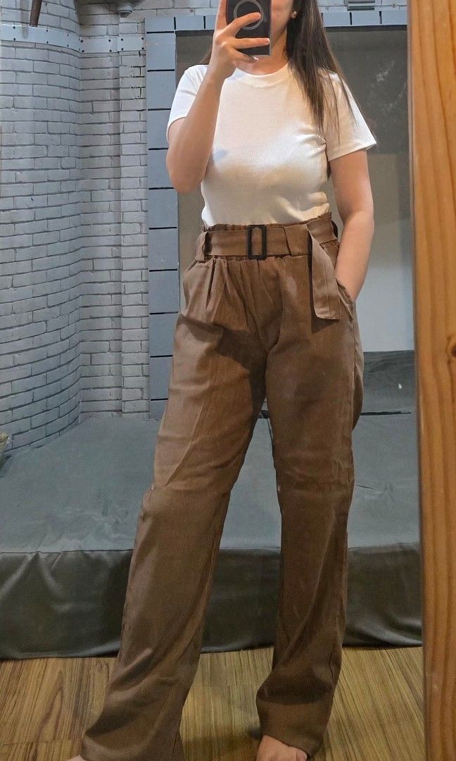 Woven Buckle Pants (Category: Other Bottoms) located in Manila. Submitted by kayencee_27 (Listing ID 1462418562, Image 3). Description: Brandnew Pants With clear plastic Paperbag style Garterized Waist - 26"-38" Length - 38" Avail colors:khaki, choco, rust.