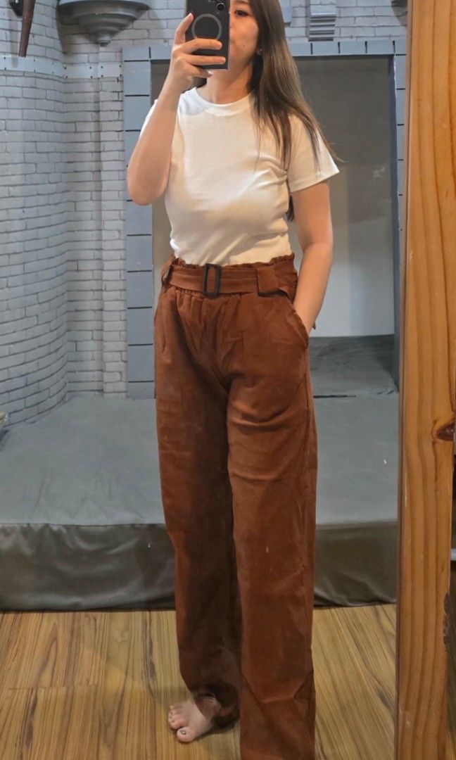 Woven Buckle Pants (Category: Other Bottoms) located in Manila. Submitted by kayencee_27 (Listing ID 1462418562, Image 1). Description: Brandnew Pants With clear plastic Paperbag style Garterized Waist - 26"-38" Length - 38" Avail colors:khaki, choco, rust.