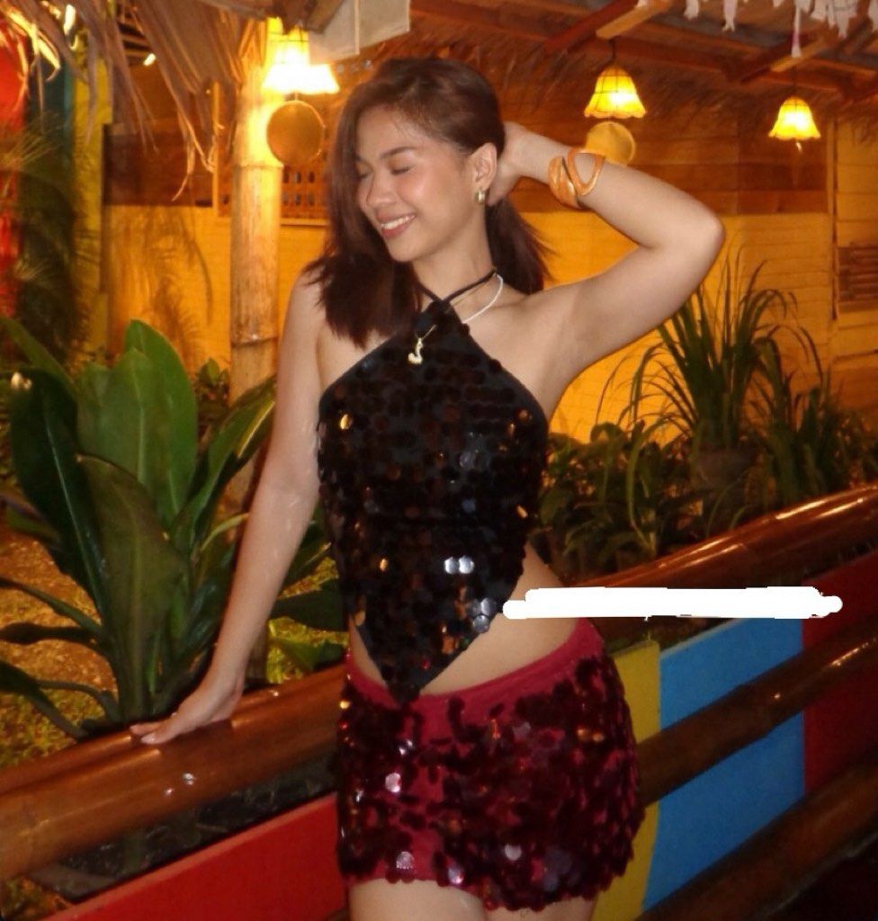 y2k Black Sequin Halter Top with Tie Straps (Category: Sleeveless) located in Caloocan City. Submitted by hoellyjane (Listing ID 1462291547, Image 2). Description: - Sparkly black halter top - Covered in shimmering sequins - Ties at the neck and back for an adjustable fit - Ideal for parties, nights out, or adding glam to any outfit - Fun and flirty design.