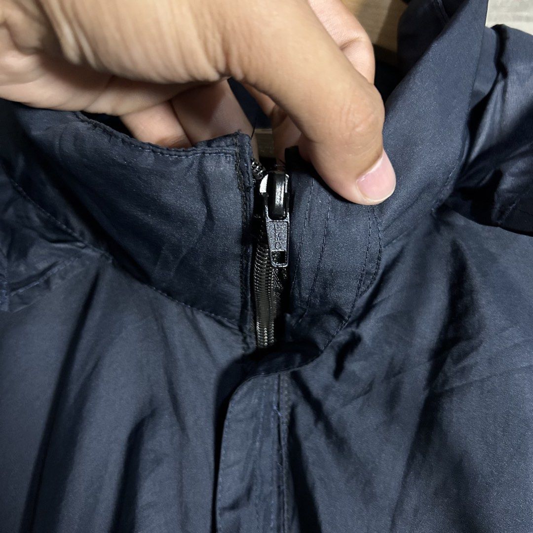Y2k Nike - Basic Logo Windbreaker (Category: Coats, Jackets and Outerwear) located in Tayabas. Submitted by streetdepartment (Listing ID 1462267681, Image 3). Description: Y2k Nike - Basic Logo Windbreaker Measurements (inches): Width: 25.5” Length: 30.5” Tagged as XXL Packable Hoodie Very good condition Flaw/s: replace zipper, and stains.